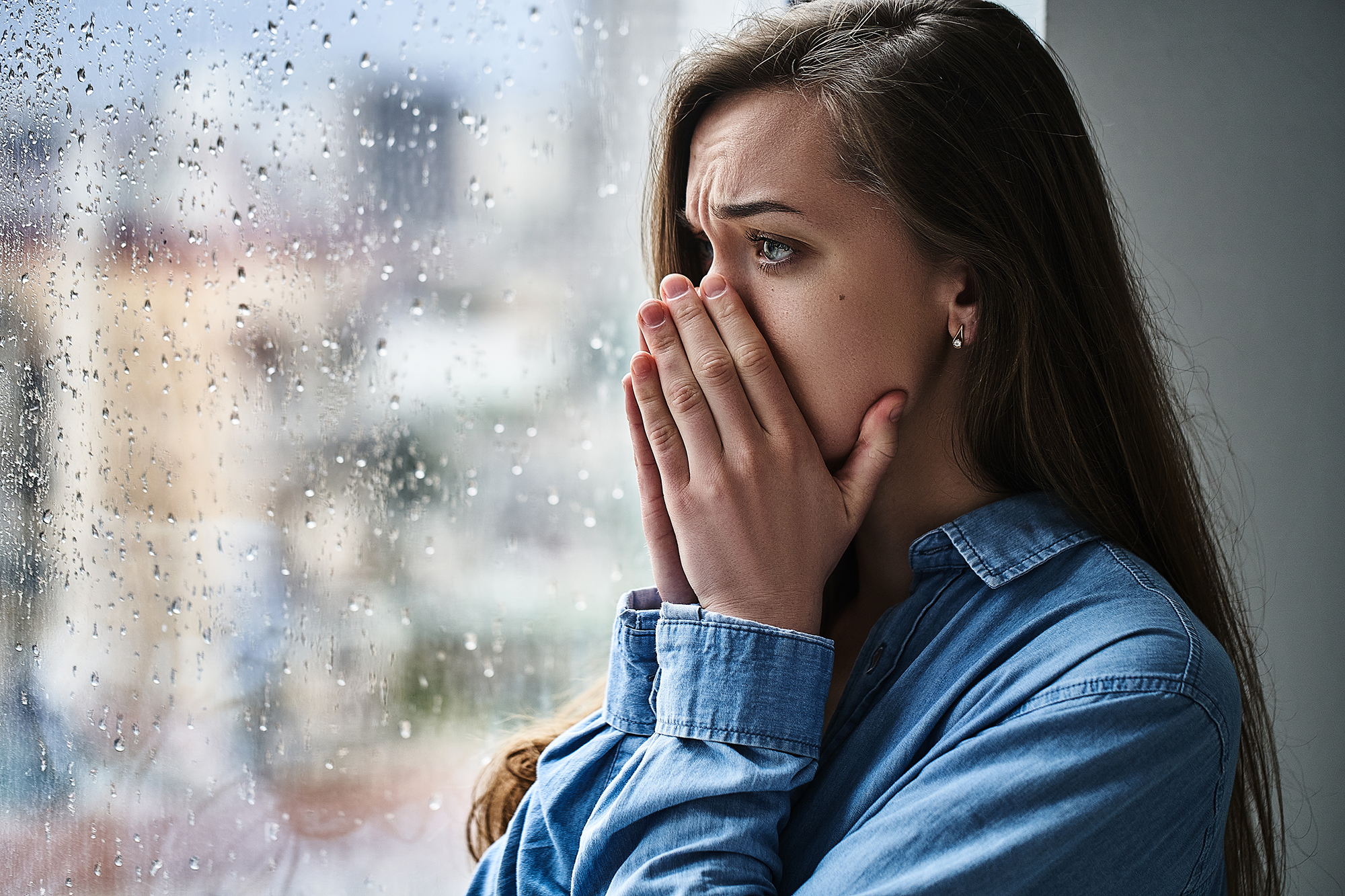 Portrait of a young stressed sad lonely melancholy shocked woman